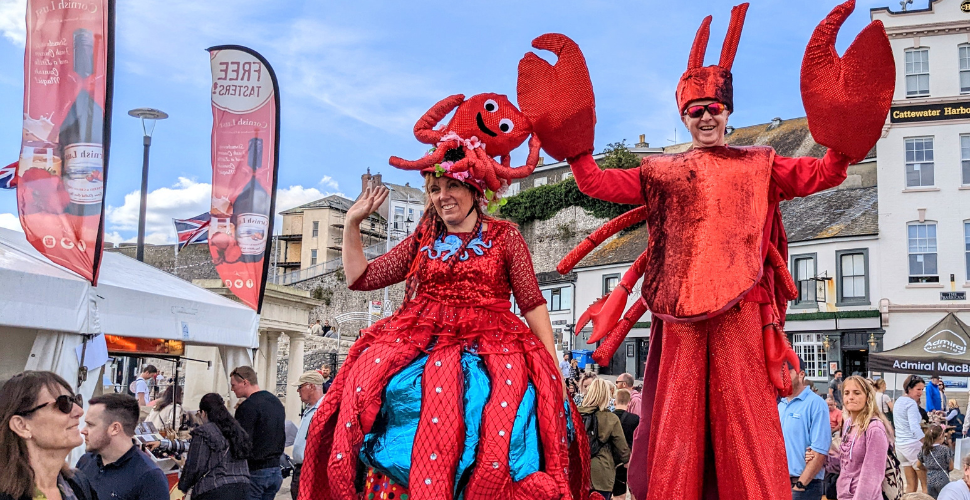 Two people in lobster outfits for Seafest  